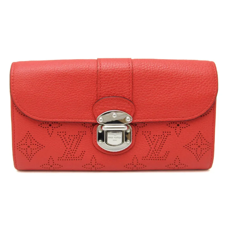 Louis Vuitton Alma bags featuring the signature top - handle designLOUIS VUITTON Amelia Wallet