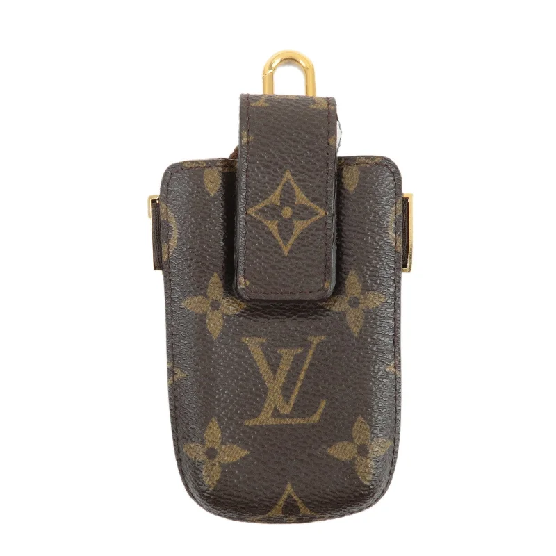 Louis Vuitton bags with a snap - button closure and a decorative charm for styleLouis Vuitton Monogram Etui Telephone International PM M63064