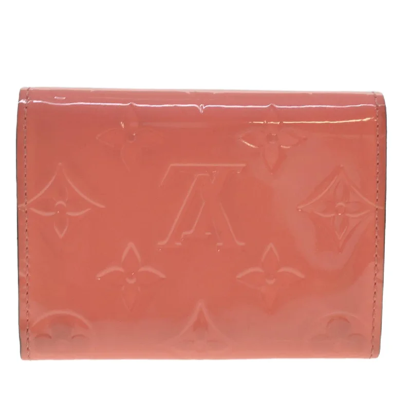 Louis Vuitton Twist bags with a contrast - colored interior for visual interestLouis Vuitton Pink Patent leather Enveloppe Carte de visite wallet accessories