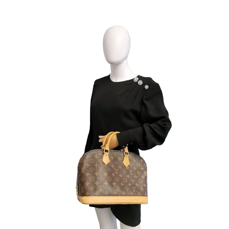 Louis Vuitton Twist bags with a snakeskin - effect panel for a bold lookLouis Vuitton Alma PM Monogram Canvas