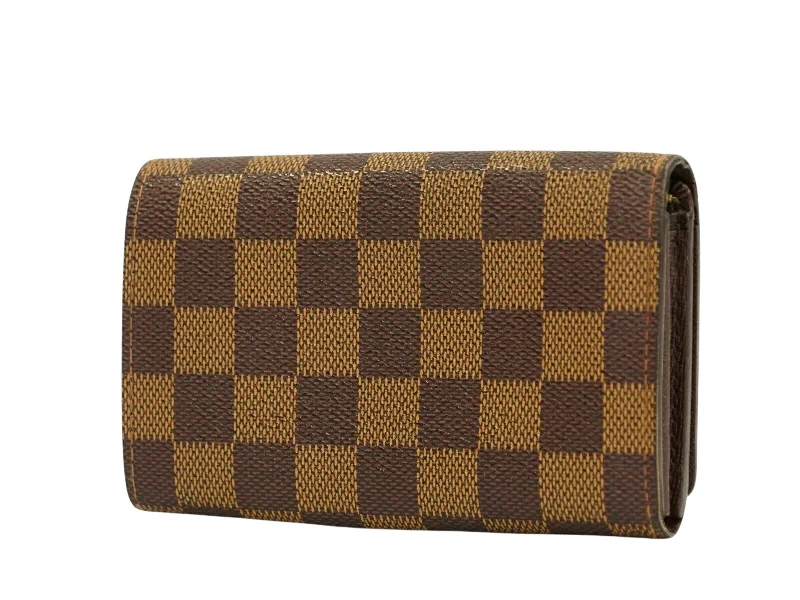 Ladies Louis Vuitton handbags with a detachable coin purse insideLouis Vuitton Brown Canvas Tresor wallet accessories