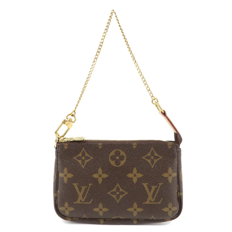 Ladies Louis Vuitton Petite Malle bags with a star - shaped charm for cutenessLouis Vuitton Monogram Mini Pochette Accessoires Pouch M58009