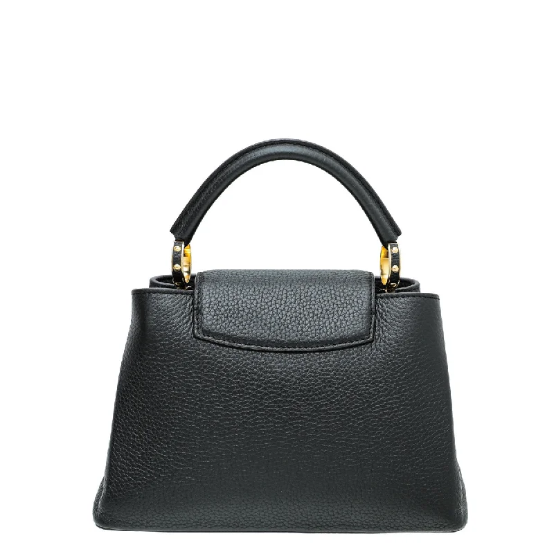 Louis Vuitton Twist bags with a crystal - embellished LV - turnlockLouis Vuitton Black Capucines BB Bag