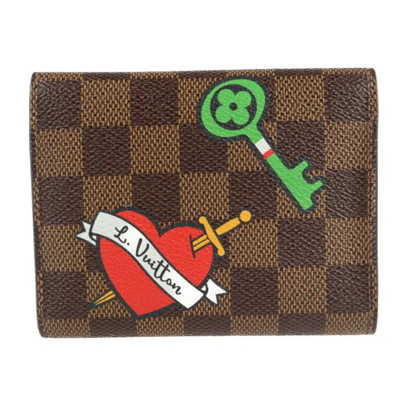 Ladies Louis Vuitton Petite Malle bags with a star - shaped charm for cutenessLouis Vuitton Brown Canvas  wallet accessories