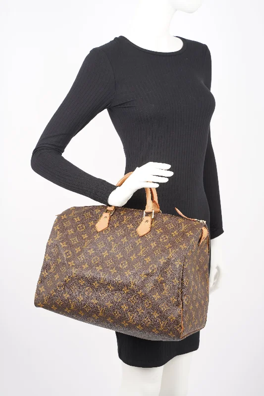 Louis Vuitton Alma bags featuring the signature top - handle designLouis Vuitton Womens Vintage Speedy Monogram 40