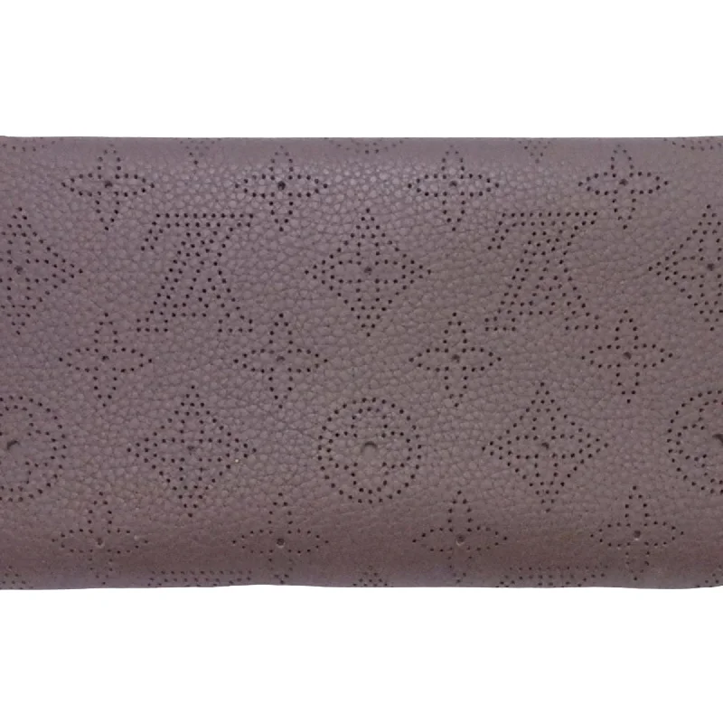 Louis Vuitton Twist bags with a crystal - embellished LV - turnlockLouis Vuitton Brown Leather Amelia wallet accessories