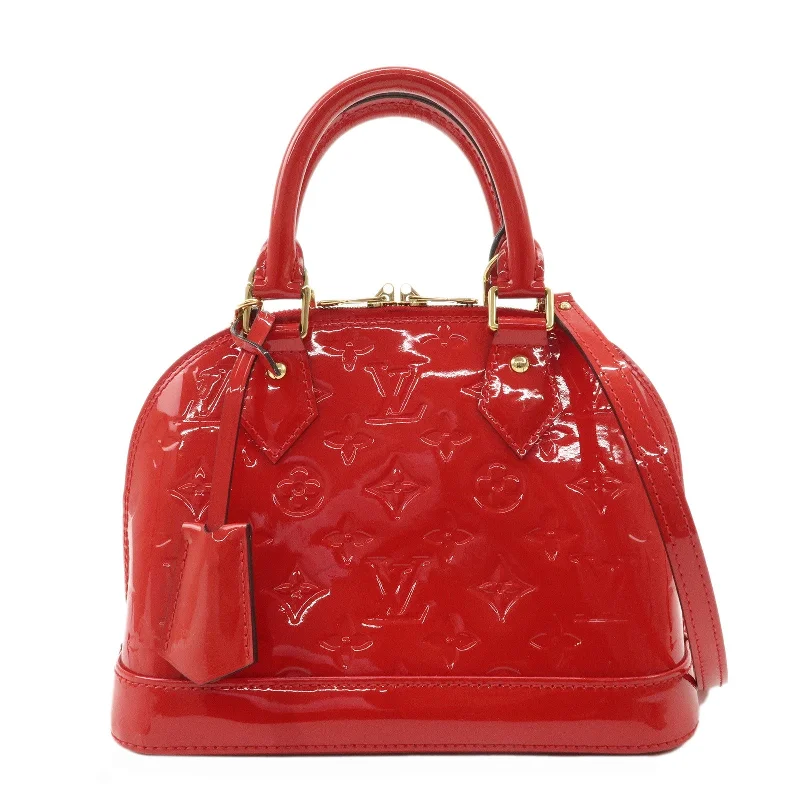 Ladies Louis Vuitton Petite Malle bags with a star - shaped charm for cutenessLouis Vuitton Monogram Vernis Alma BB Hand Bag Rouge M91698