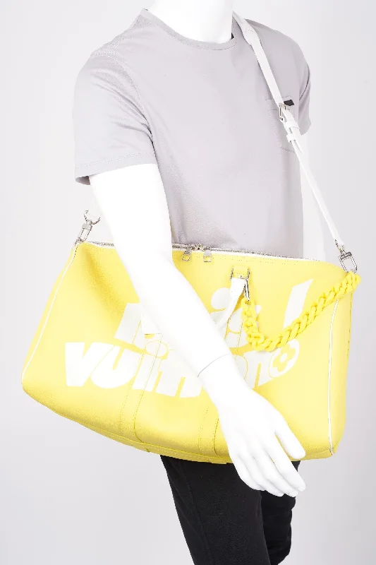 Ladies Louis Vuitton Capucines bags with a detachable shoulder strapLouis Vuitton Keepall Bandouliere 50 Yellow / White Leather