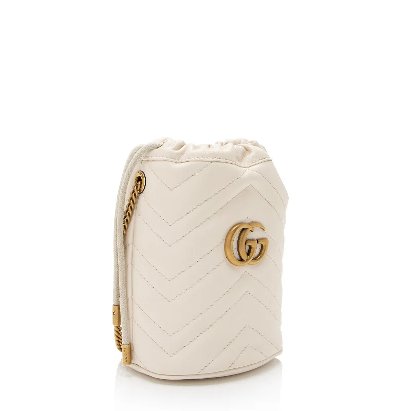 Gucci Marmont bags for women with a contrast - colored interiorGucci Matelasse Leather GG Marmont Mini Bucket Bag (SHF-OKI41N)