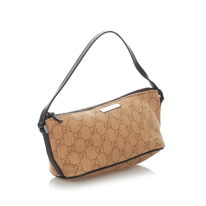 Women Gucci bags with a snap - button closure and a decorative charmGucci GG Canvas Boat Baguette (29827)