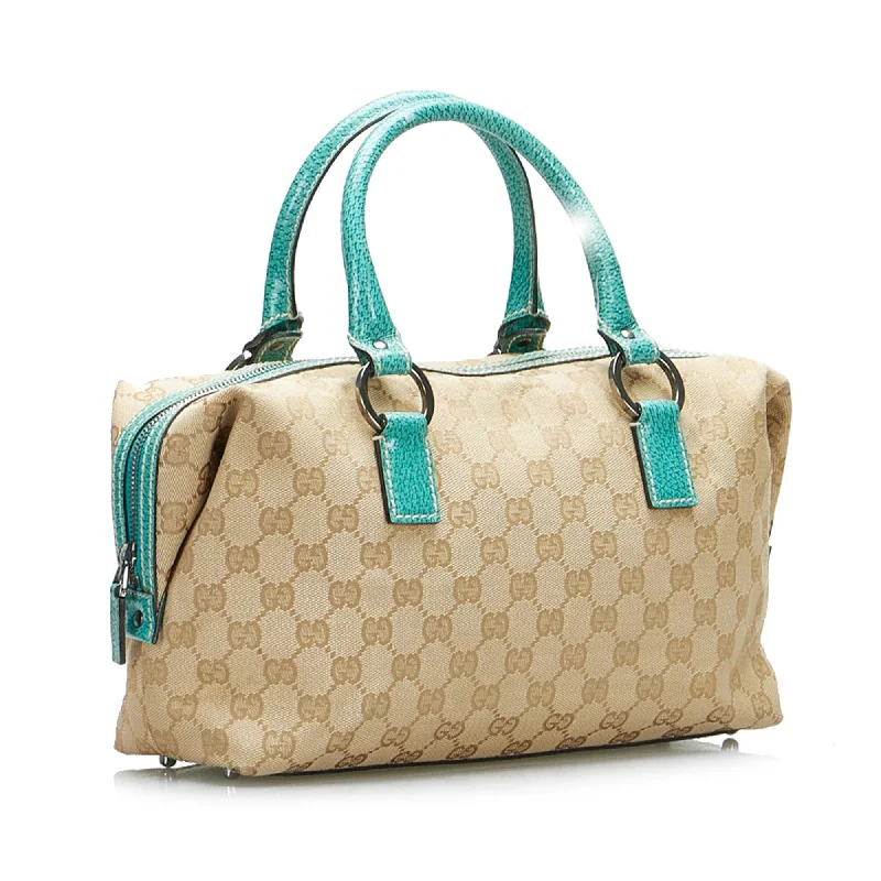 Gucci Marmont bags for women with quilted leather exteriorsGucci GG Canvas Boston Bag (sMTQ2e)