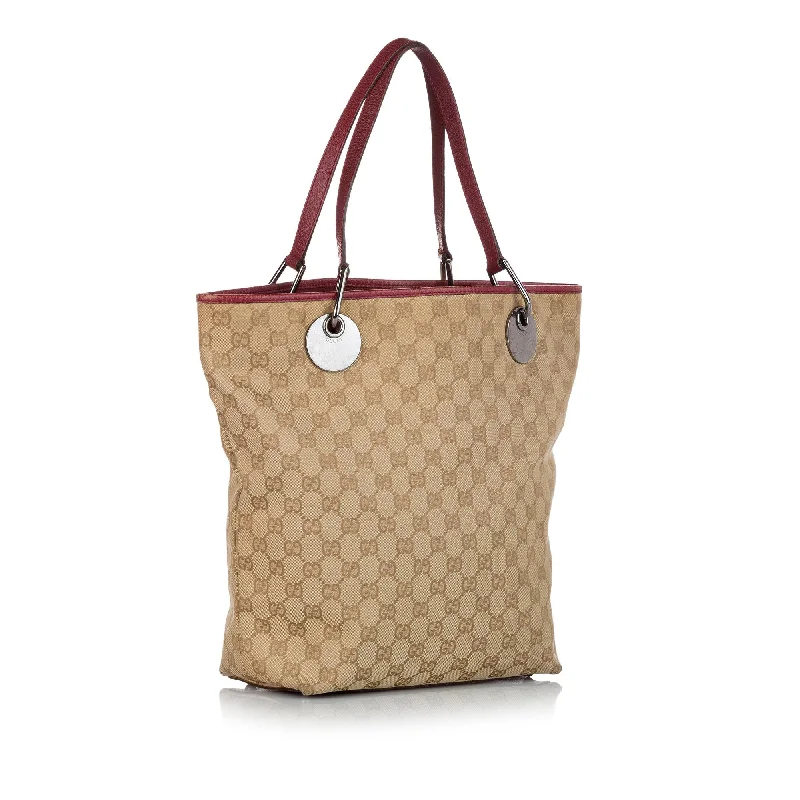 Women Gucci bags with interlocking G hardware for a classic lookGucci GG Canvas Eclipse Tote Bag (32163)