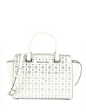 Michael Michael Kors Bags for influencers to carry at eventsMichael Michael Kors Perforated Floral Medium Selma Satchel