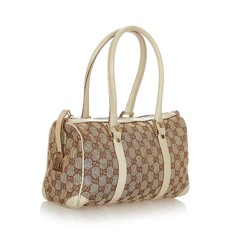 Ladies Gucci Dionysus bags in a pastel colorGucci GG Canvas Boston Bag (22683)