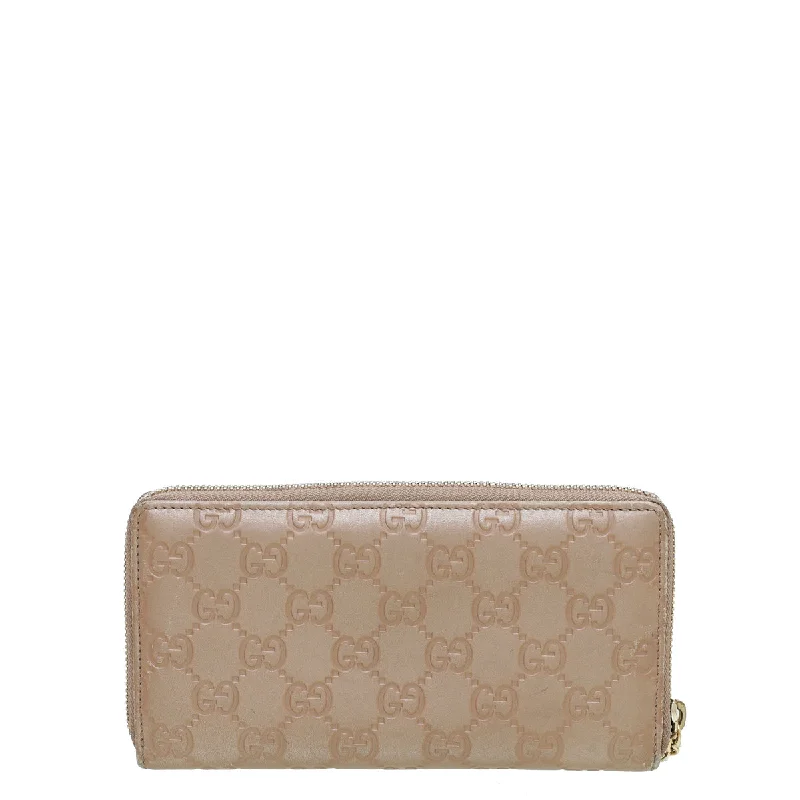 Women Gucci Sylvie bags with a detachable ribbon detailGucci Rose Beige GG Guccissima Zip Around Lovely Wallet