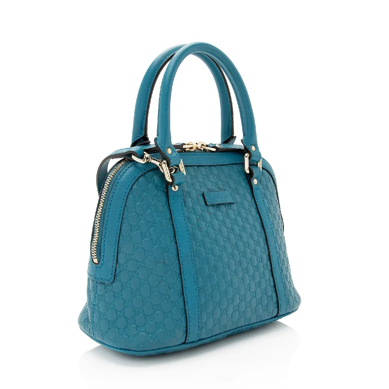 Women Gucci bags with a snap - button closure and a decorative charmGucci Microguccissima Leather Joy Dome Small Satchel (SHF-Ifl6eT)