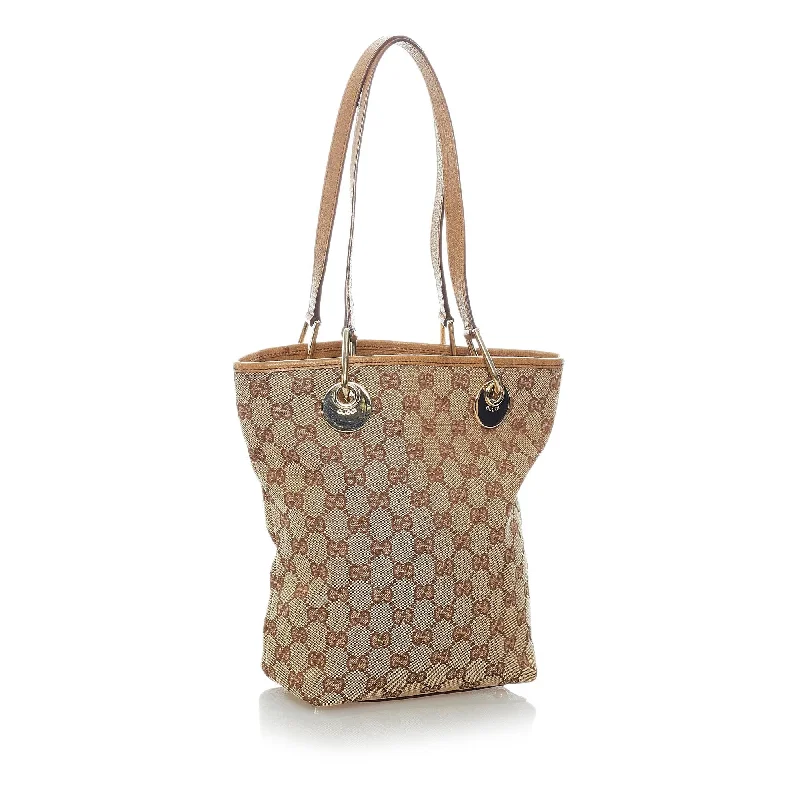 Women Gucci backpacks with a luxurious leather finishGucci GG Canvas Eclipse Tote Bag (32291)