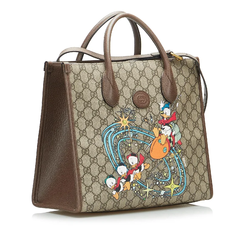 Women Gucci crossbody bags in a bold red colorGucci x Disney Small GG Supreme Donald Duck Satchel (SHG-18nIFQ)