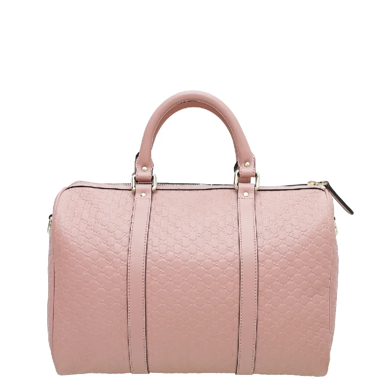 Gucci backpacks for women with a hidden back pocketGucci Dusty Pink GG Microguccissima Joy Boston Medium Bag