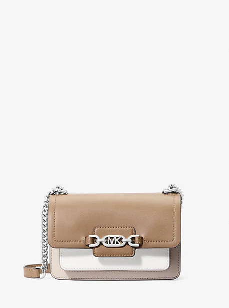 Michael Michael Kors Bags for safari trips in a durable and earth - toned styleMK Heather Extra-Small Logo Crossbody Bag - Natural - Michael Kors