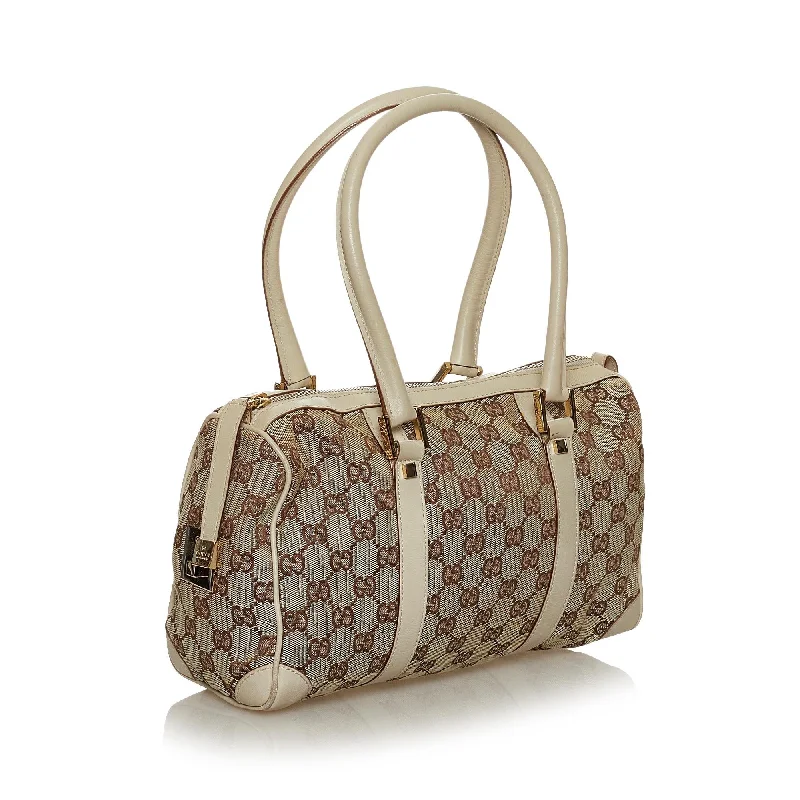 Women Gucci Sylvie bags with a monogram - embossed leatherGucci GG Canvas Boston Bag (28787)