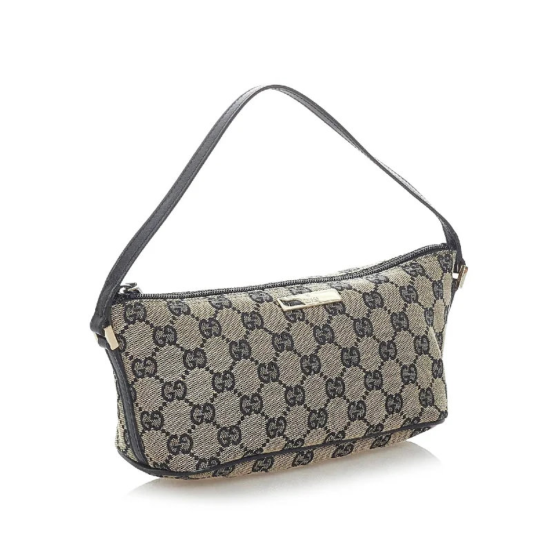 Women Gucci Sylvie bags with a monogram - embossed leatherGucci GG Canvas Boat Baguette (32903)