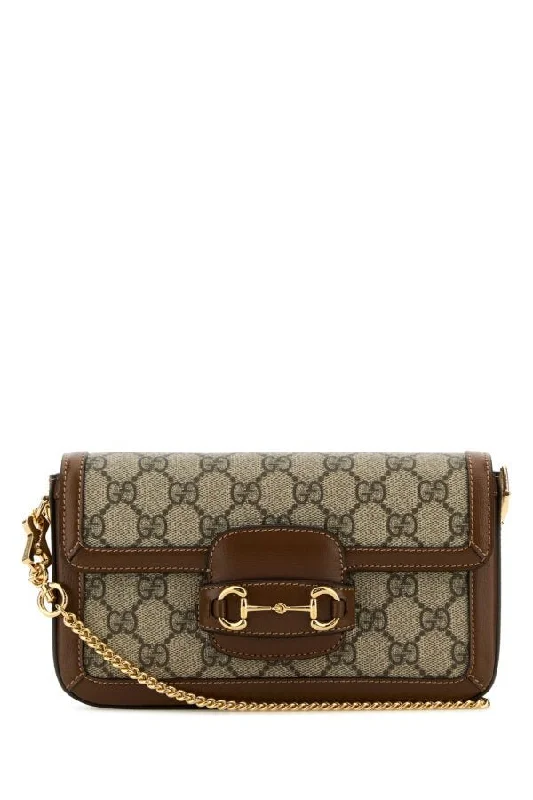 Gucci Marmont bags for women with a contrast - colored interiorGucci Woman Gg Supreme Fabric Mini Gucci Horsebit 1955 Handbag