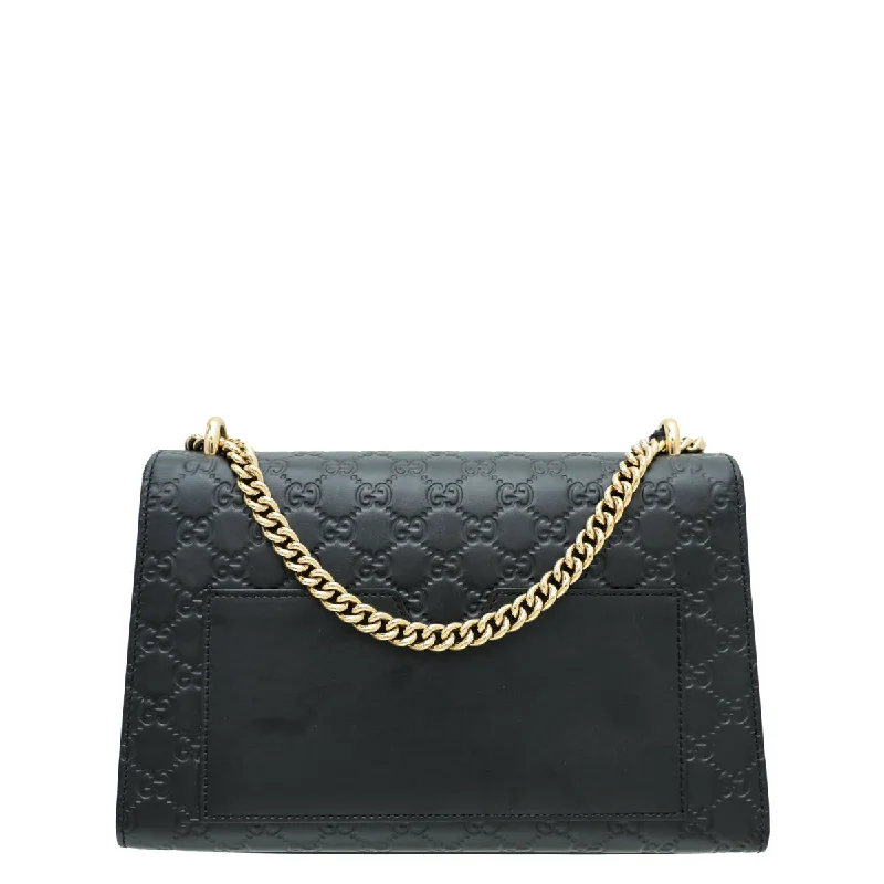 Women Gucci bags with interlocking G hardware for a classic lookGucci Black Guccissima Padlock Medium Bag